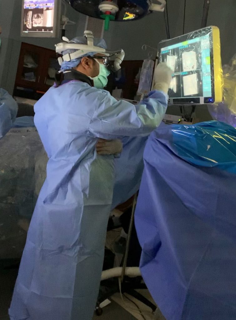 dr. deepak reddy performing robotic surgery